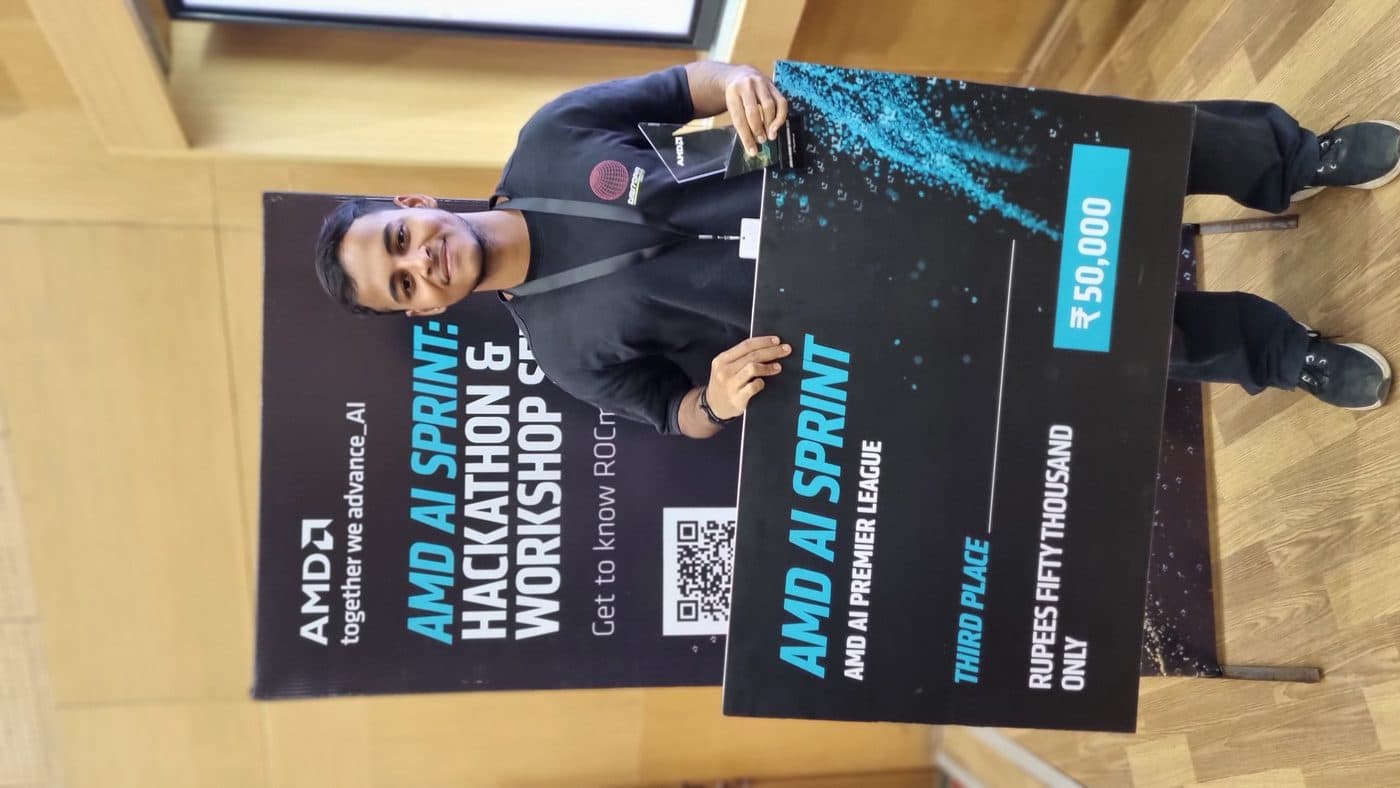 Yash Varma holding the AMD AI Sprint prize at IIT Bombay